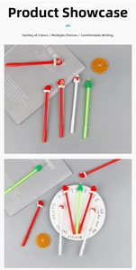Detail of Christmas gel pens featuring silicone snowman, tree, and Santa hat toppers