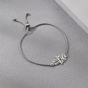 Detail of silver Hamsa Hand charm with hollow pattern and adjustable box chain