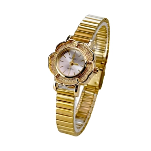 Vintage gold women's watch featuring a flower-shaped case and quartz movement