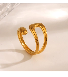 Macro shot of polished gold adjustable open ring with interlocking double arc design