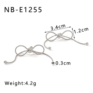 Detailed view of silver bow-shaped tassel earrings with exact size and weight dimensions
