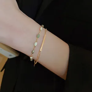 French vintage double-layered gold bracelet with green enamel and bead chain detail