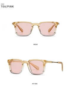 Close-up of square tea-colored frames with pink lenses and detailed metal hinges