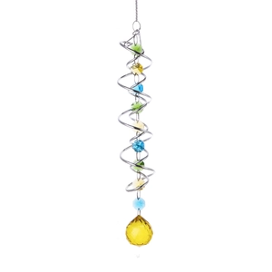 Close-up of silver metal spiral wind spinner with colorful glass beads and yellow crystal