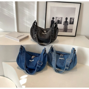 Detailed comparison of three denim crescent moon bags in grey, dark blue and light blue colors