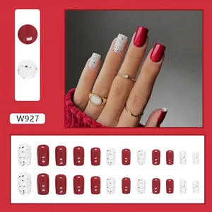 Press-on nail set W927 featuring solid red and white quail egg patterns in medium-long length