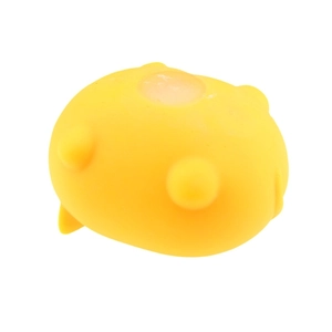 Close-up of yellow Shiba Inu squeeze toy showing durable rubber texture and details