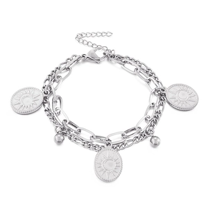 Double-layer stainless steel bracelet with sun and moon oval pendants in silver finish