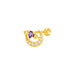 Close-up of golden moon earring with purple teardrop gem and bat wings decoration
