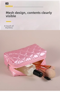 Detail of pink quilted makeup bag showing spacious interior with cosmetic items