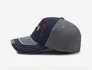 Detail of vintage washed baseball cap featuring side patchwork and red circle embroidery