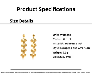 Detail view of long gold stainless steel teardrop earrings with size and weight specs