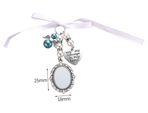 Detail of memorial photo charm with pearls, bow ribbon and engraved heart pendant