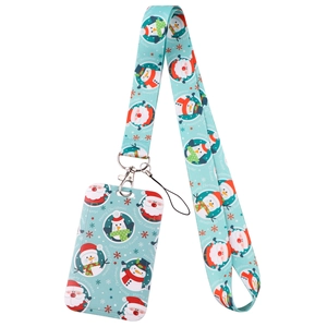 Detail of Christmas lanyard and card holder set with Santa and Penguin patterns