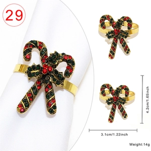 Detail view of candy cane Christmas napkin ring with red and green rhinestones and dimensions