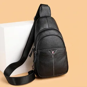 Classic black leather men's chest bag with lychee grain and silver shield emblem