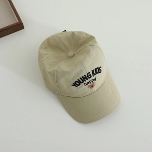 Detail view of khaki quick-dry baseball cap with happy bear embroidery and laser-cut holes