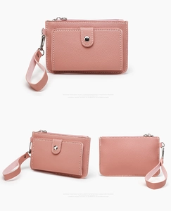Pink litchi texture leather wallet with snap button flap and silver metal zipper detail