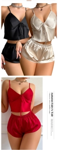 Detail view of v-neck satin pajama set with spaghetti straps and bow tie decoration