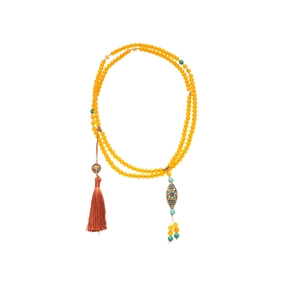 Vintage layered amber crystal beaded necklace with golden pendant and red tassel