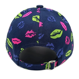 Detail view of the back of a navy lip-print baseball cap with an adjustable metal buckle