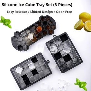 Three-piece black silicone ice cube trays including honeycomb and rectangular grid molds