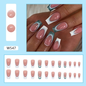 Light blue French press-on nails with silver glitter and white dots ballerina style