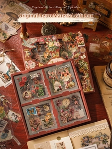 Macro shot of 100pcs vintage PET stickers box set with floral and angel motifs