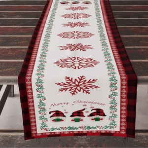 Linen Christmas table runner with red snowflakes and festive gnomes on vintage wood