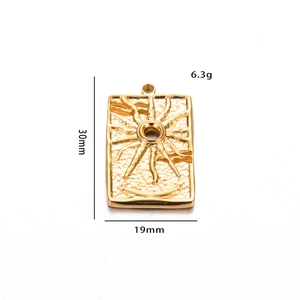 Detail view of gold rectangle sunburst pendant showing 30x19mm size and 6.3g weight