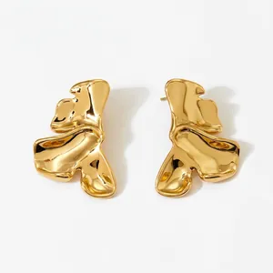 Polished 316 stainless steel earrings with irregular abstract gold liquid metal design