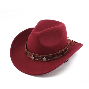 Detail view of burgundy felt cowboy hat with ethnic braided band and metal coins