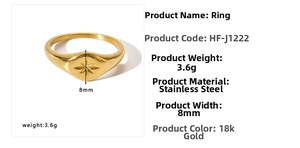 Detail of 8mm stainless steel signet ring with engraved star pattern in 18k gold finish