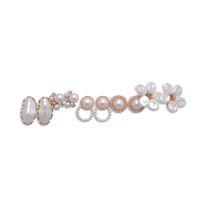 Ten-piece pearl and diamond floral stud earring set with gold base on white background