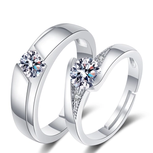 Minimalist silver couple rings set with round stones and adjustable open band design