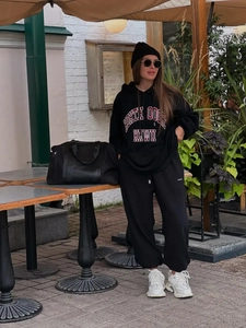 Black oversized North Shore Hawaii hoodie and joggers set for a street style outdoor look