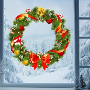 Détail de couronne de Noël avec aiguilles de pin et nœuds rouges sur fenêtre enneigée