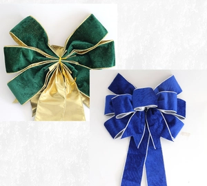 Close-up of 60cm velvet Christmas bows with wired gold and silver edges in green and blue