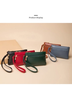 Litchi pattern leather coin purses in various colors with wrist straps and zippers