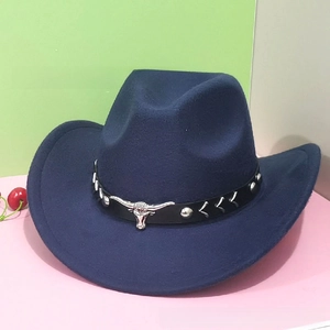 Detailed view of dark blue felt jazz hat with leather band and metal bull head logo