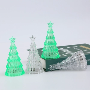 Detailed view of layered acrylic Christmas tree night light with crystal star texture