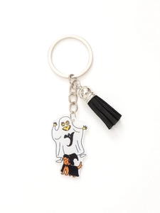 Detail of Halloween ghost and dog acrylic keychain with a black fringe tassel charm