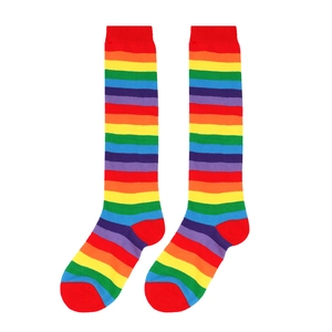 Flat lay of colorful rainbow striped knee high socks with vibrant multi-color patterns