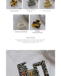 Close-up of tortoise shell and floral pattern cellulose acetate hair claw clips