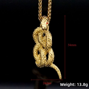 Detailed close-up of 54mm gold snake pendant with red eyes and scale texture on chain