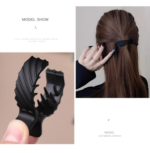 Macro detail of inner teeth and matte finish on high ponytail shark clip
