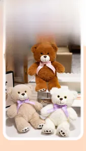 Detailed plush teddy bears in brown, beige, and white with polka dot bows and paw pads
