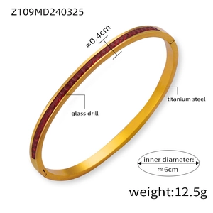 Detail view of titanium steel gold bracelet with red glass drill inlay and dimensions
