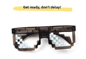 Detail view of translucent grey pixel-style sunglasses with Thug Life 8-bit sawtooth design