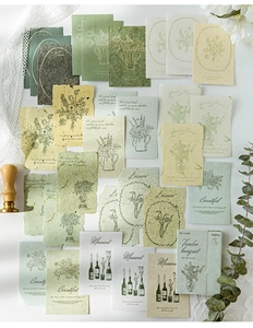 Artistic layout of 30 vintage floral scrapbook papers with lace and wax seal accents